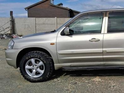 Mazda tribute año 2004 último precio