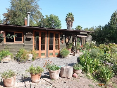 Increíble terreno rodeado de naturaleza con acogedora casa a faldas del cerro